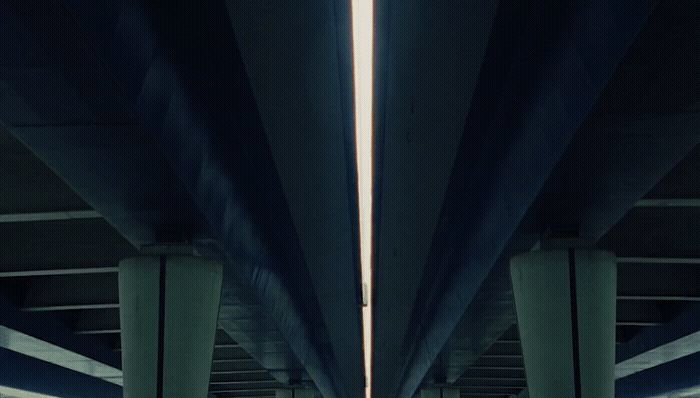 a view of the underside of a bridge from below