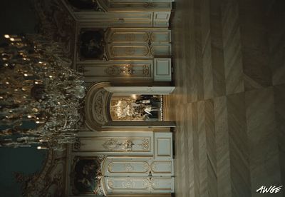 a chandelier hanging from the ceiling of a building