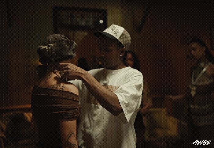 a man and a woman standing next to each other