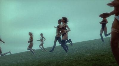 a group of women running in a field