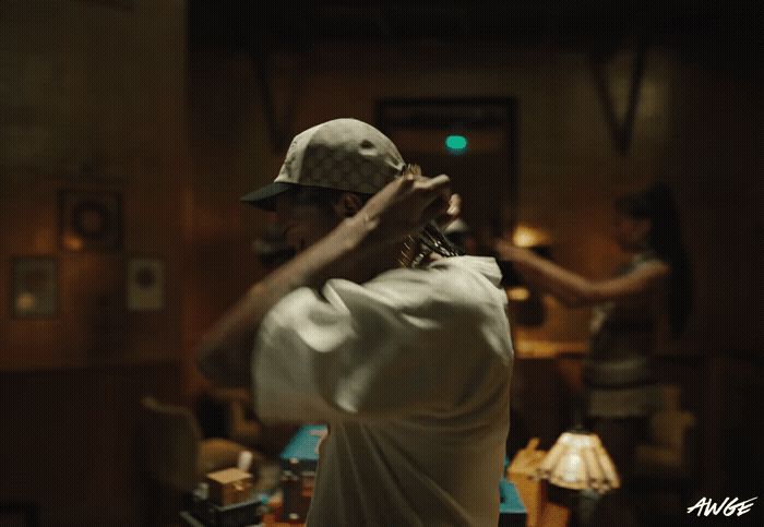 a man playing a flute in a room