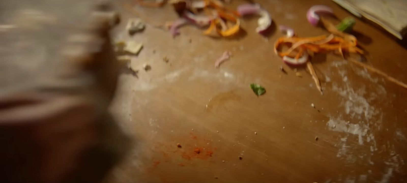 a wooden table topped with lots of food