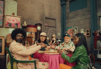 a group of people sitting around a table