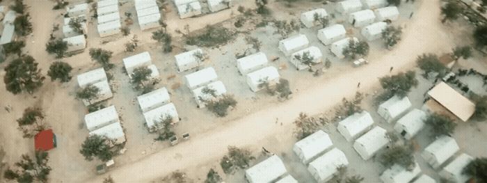 an aerial view of a lot of houses and trees