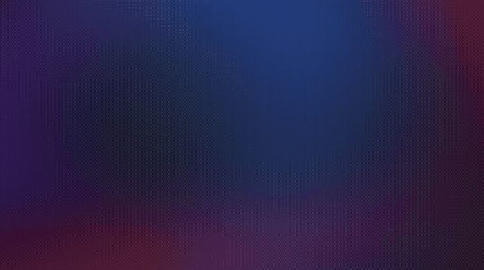 a blurry image of a purple and blue background