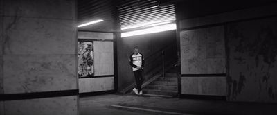 a man walking down a flight of stairs