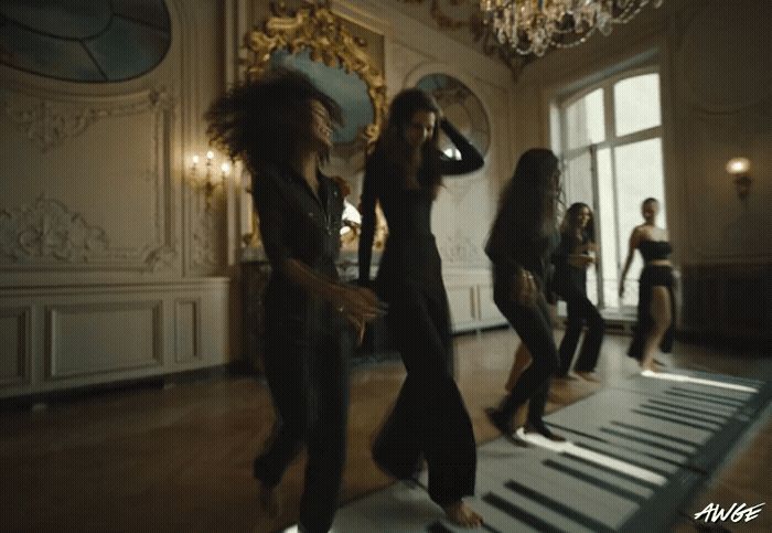 a group of women dancing on a dance floor