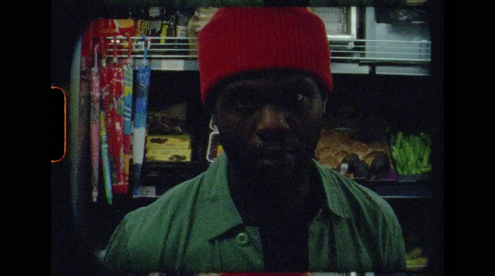 a man wearing a red hat in a store