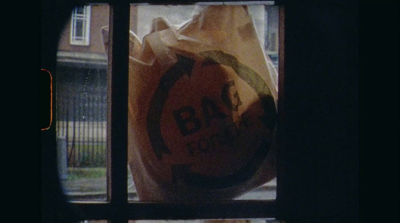 a bag sitting on top of a window sill