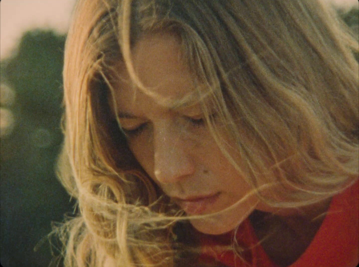 a close up of a person with long hair