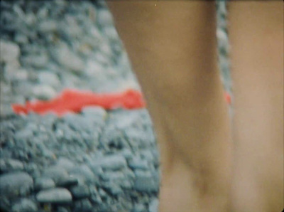 a close up of a person's legs and shoes