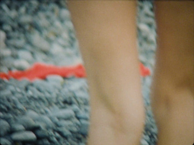 a close up of a person's foot on a rug