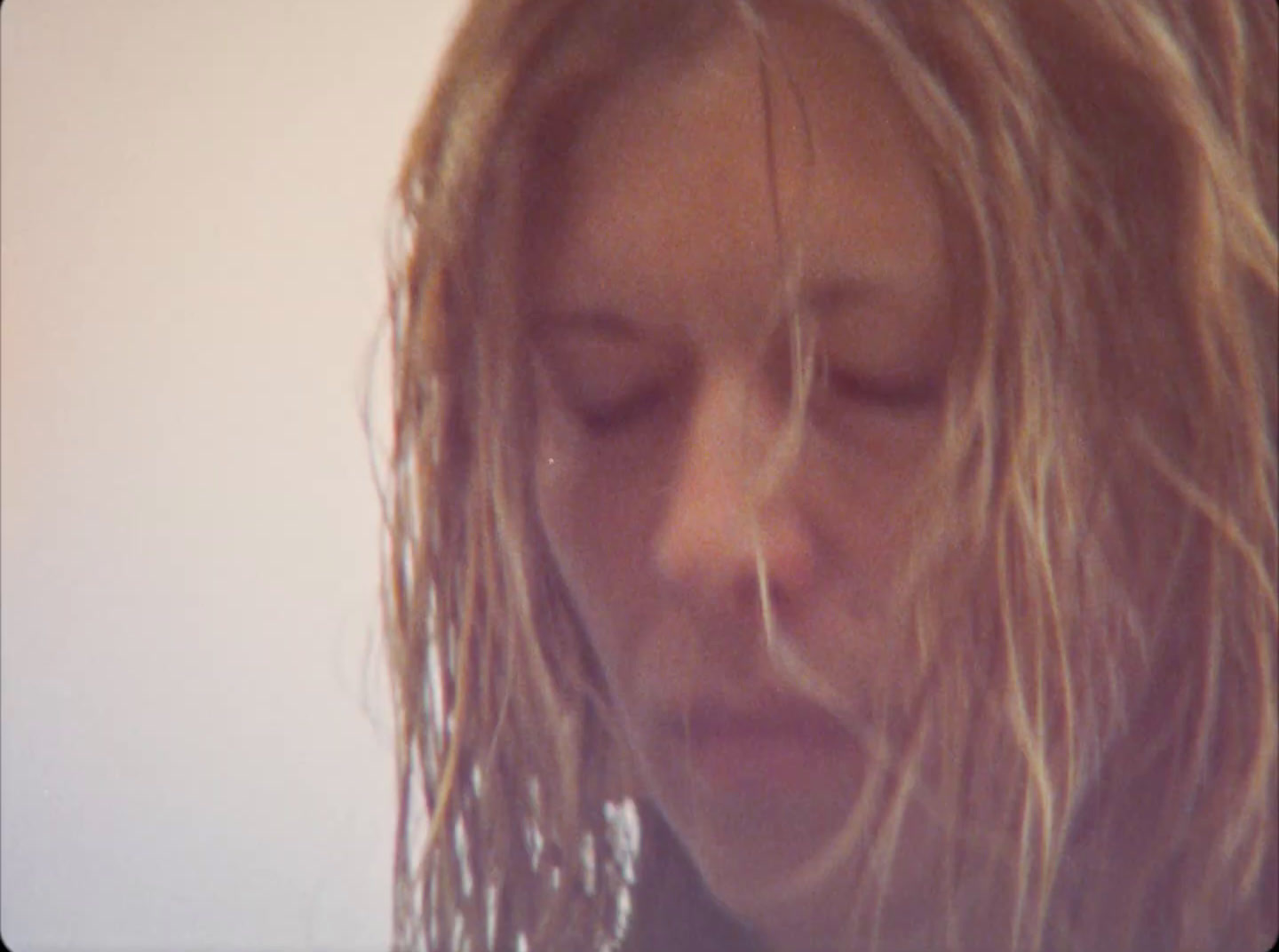 a close up of a person with long hair