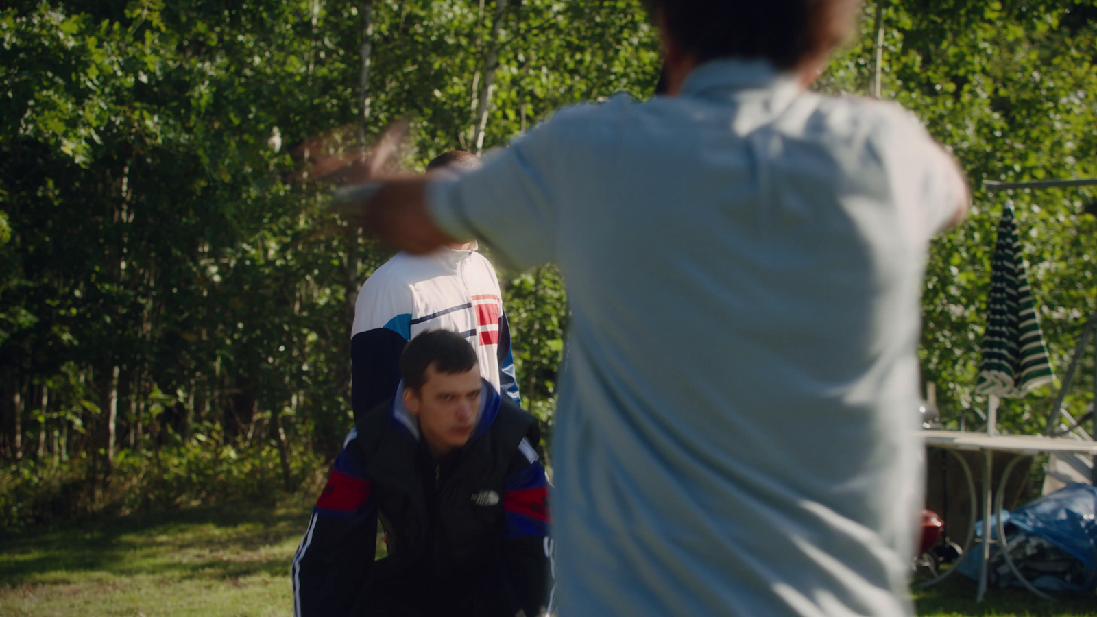 a group of men playing a game of frisbee