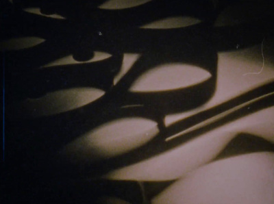 a close up of a pair of scissors on a table