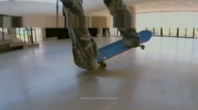 a person with a skateboard in a building