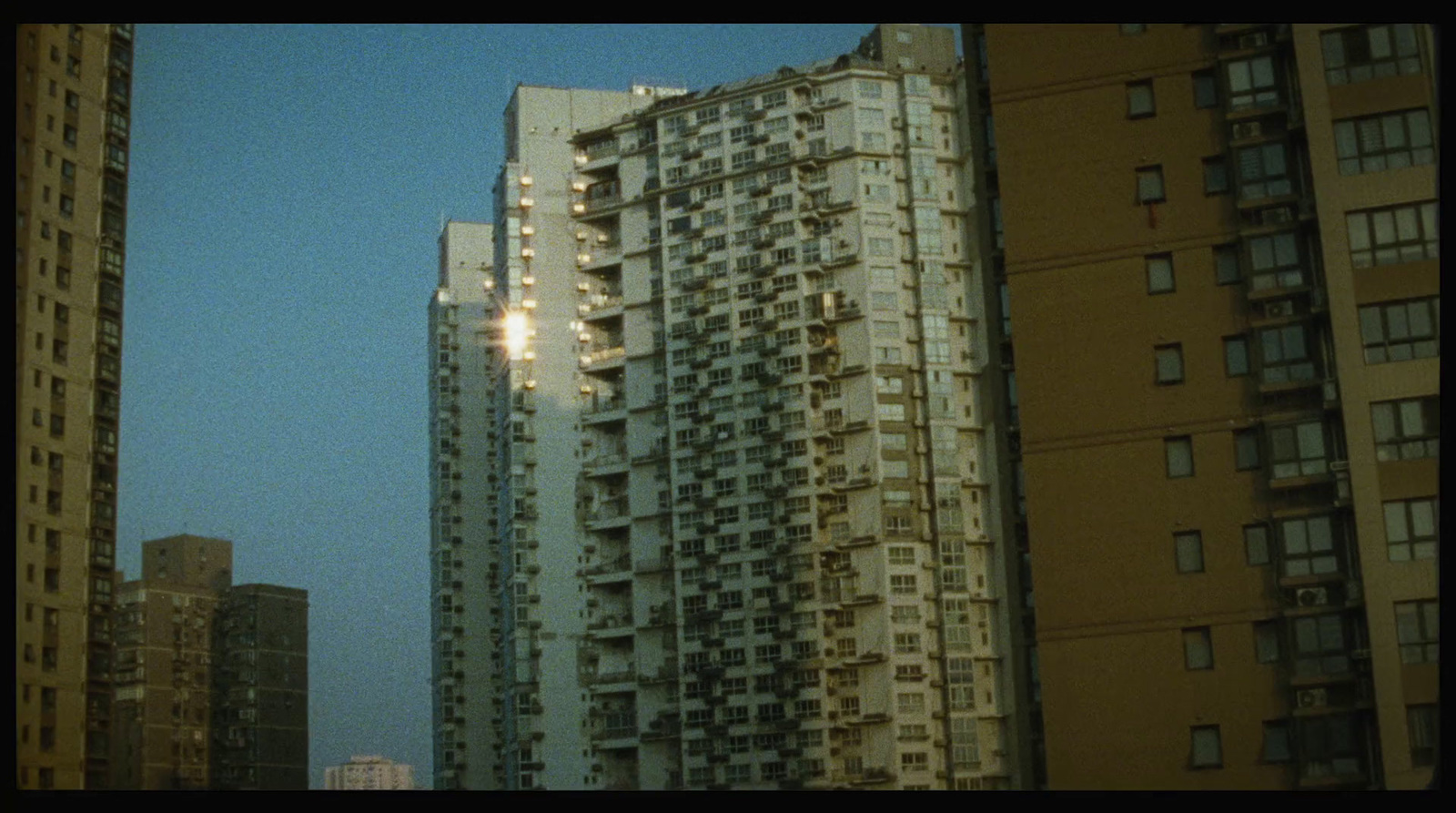 a view of some tall buildings in a city