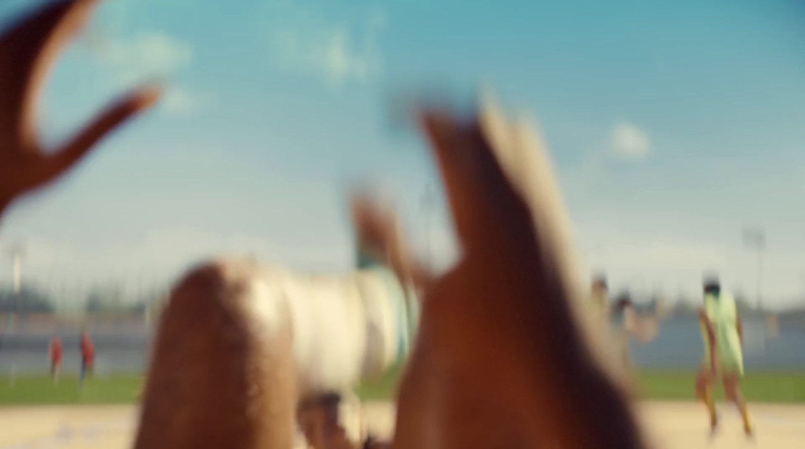 a blurry photo of a group of people on a beach