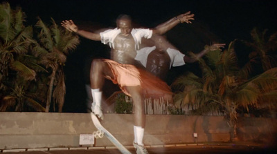 a man is doing a trick on a skateboard