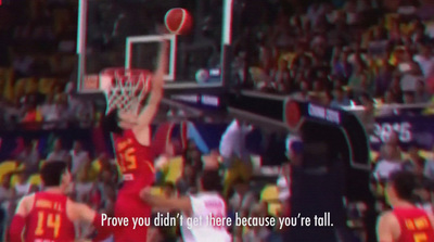 a basketball player jumping up to dunk a basketball