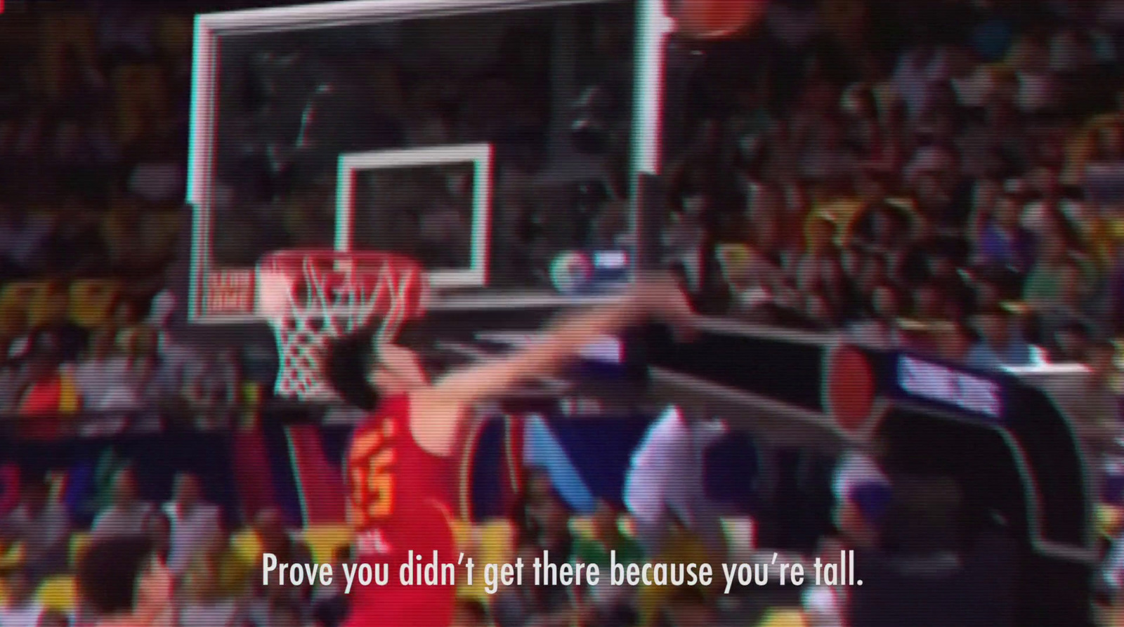 a man that is standing in front of a basketball hoop