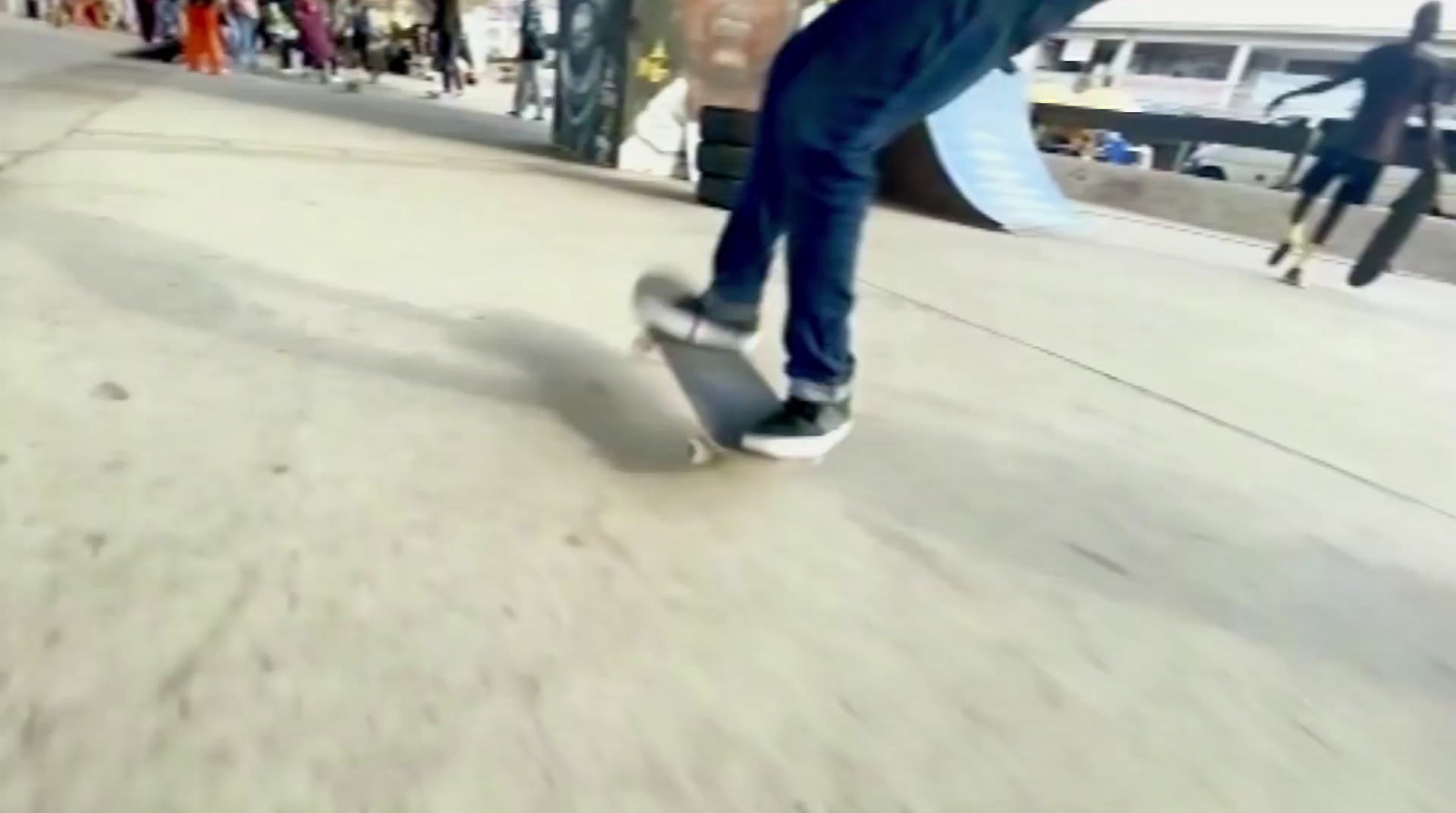 a man riding a skateboard down the side of a ramp