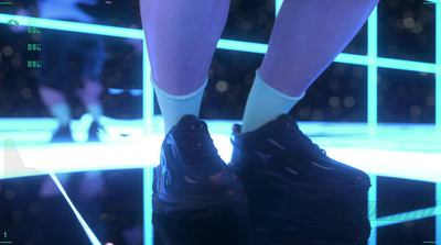 a close up of a person's legs and shoes