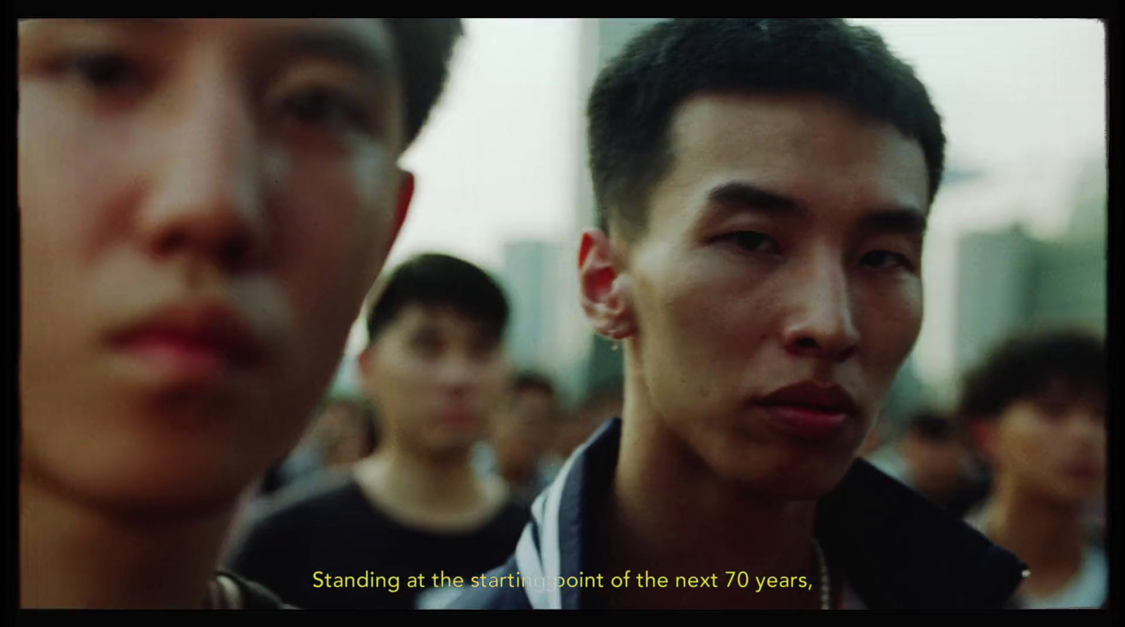 a group of young men standing next to each other