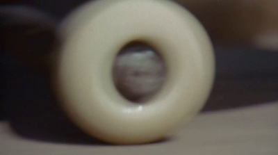 a close up of a white object on a table