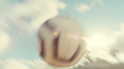 a blurry photo of a ball flying through the air