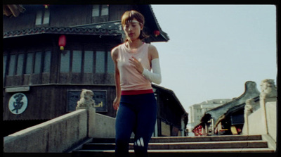 a woman walking down a flight of stairs