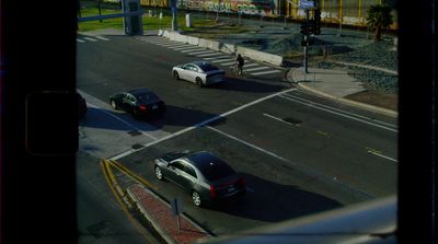 a view of a city street from a window