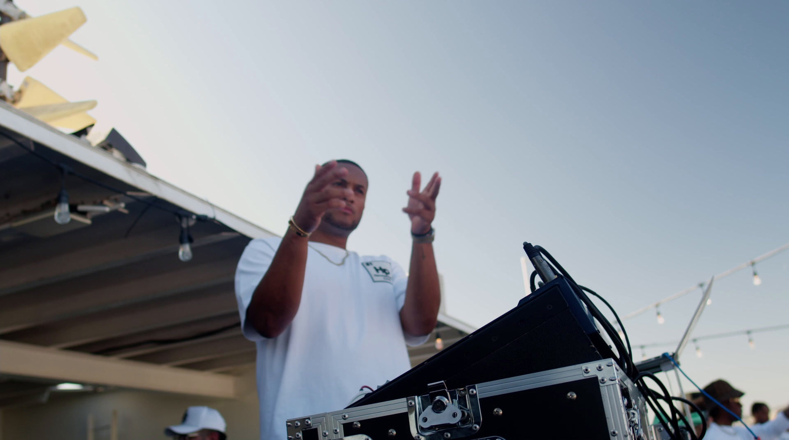 a man standing in front of a dj set