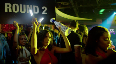 a group of people dancing at a party