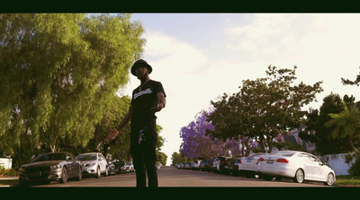 a man standing in the middle of a street