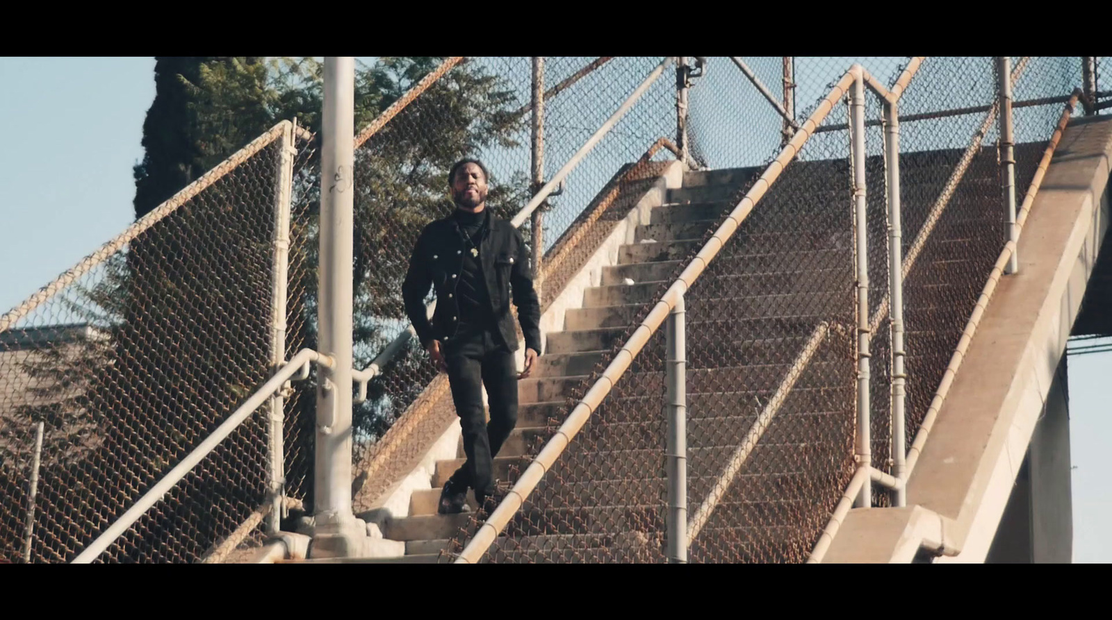 a man walking up a set of stairs