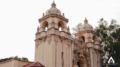 a tall building with a clock on the top of it