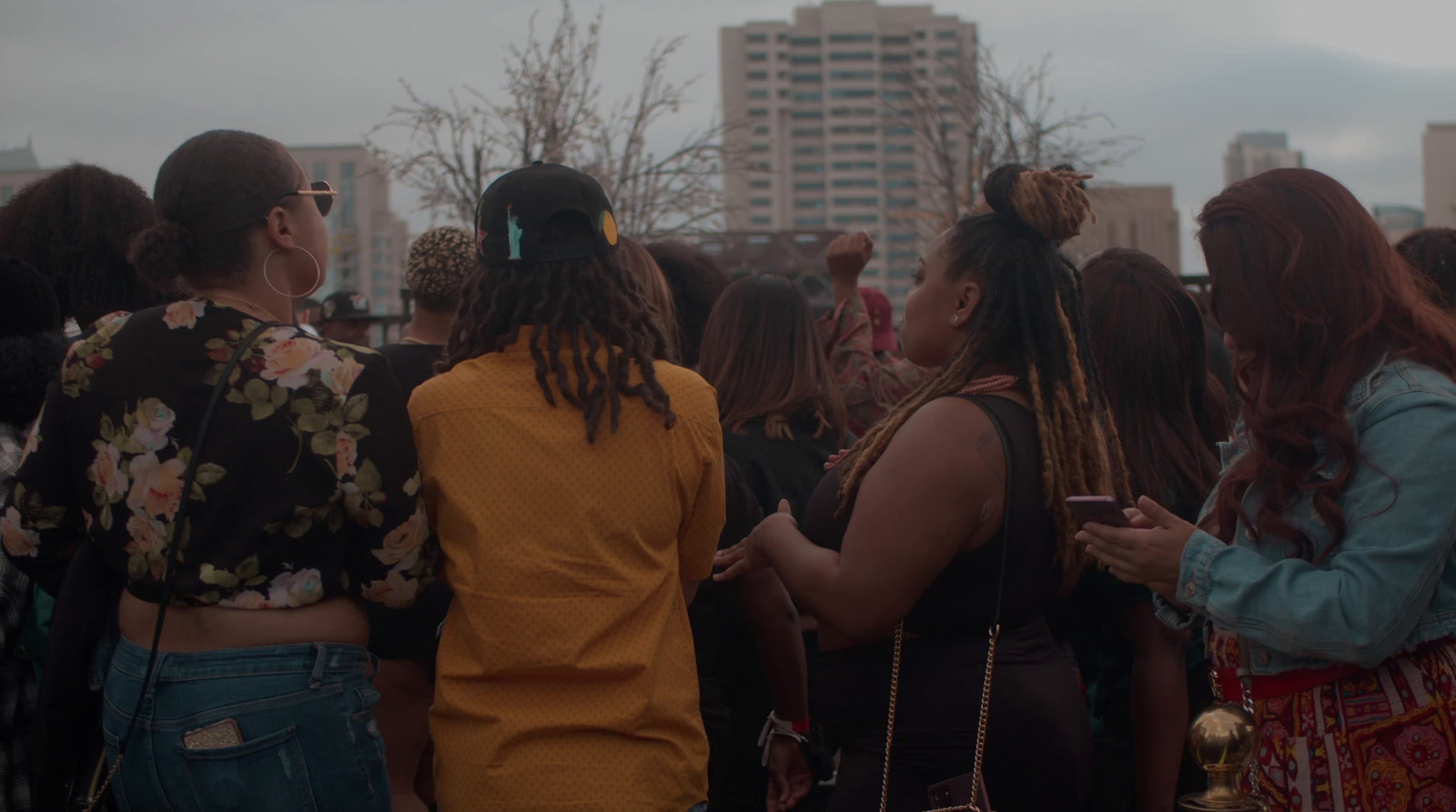 a group of women standing next to each other