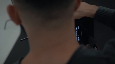 a man taking a picture of himself in a mirror