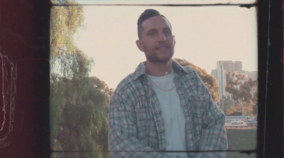 a man standing in front of a window