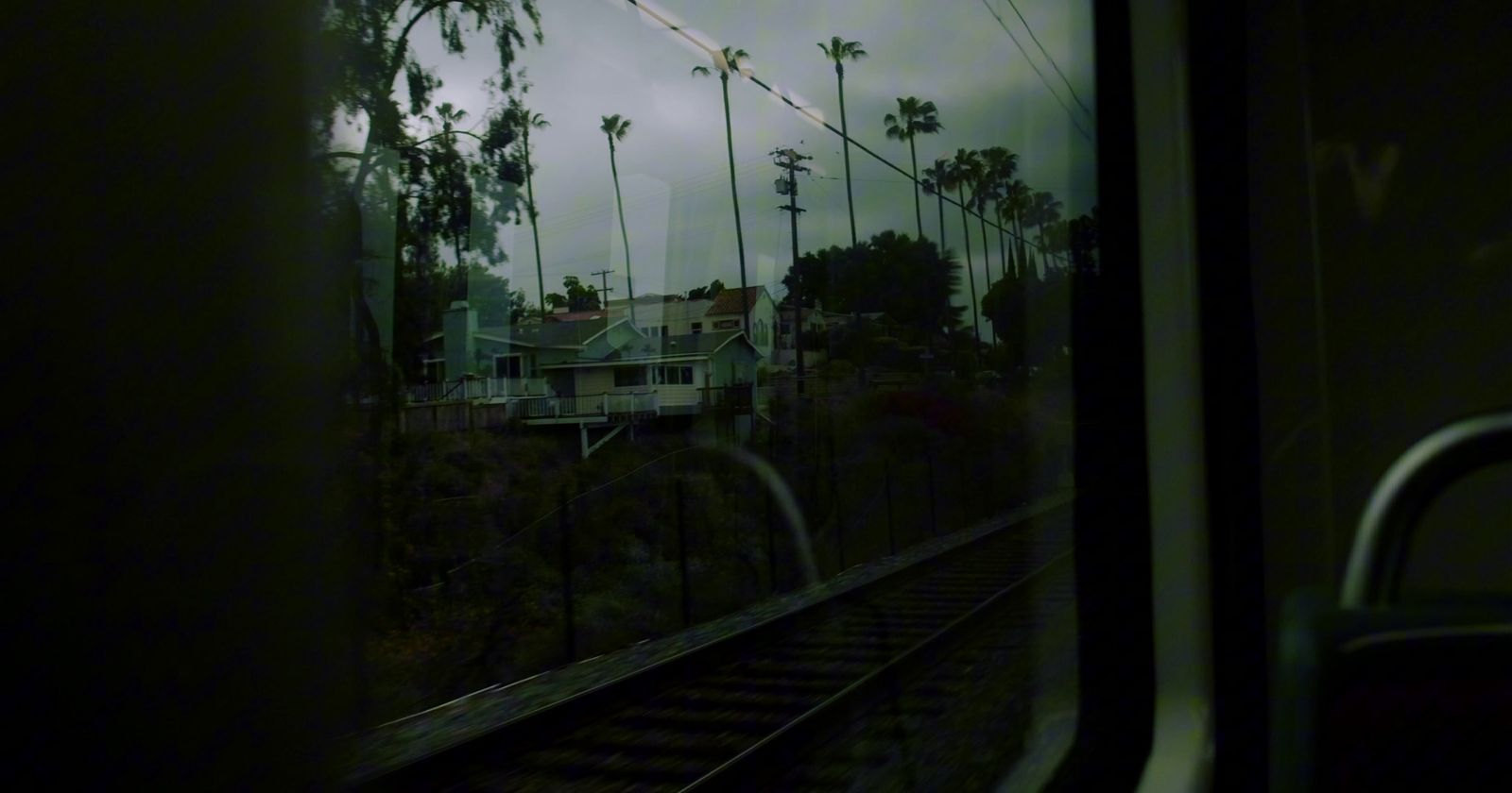 a view of a house from a train window