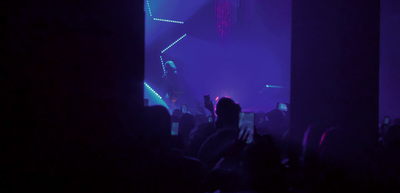 a group of people standing on top of a stage