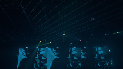 a group of people standing on top of a stage