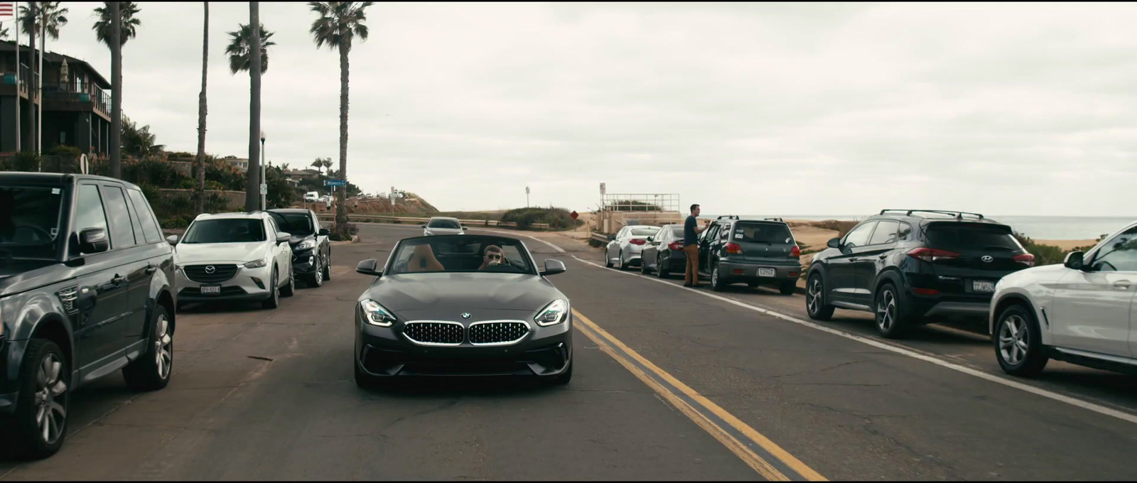 a bunch of cars that are sitting in the street