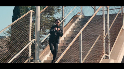 a man is running down a set of stairs