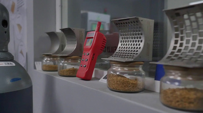 a red phone sitting on top of a counter