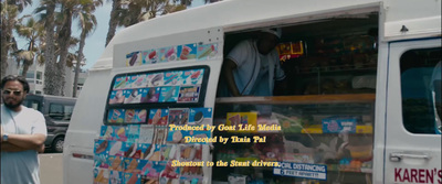 a man standing in front of a food truck