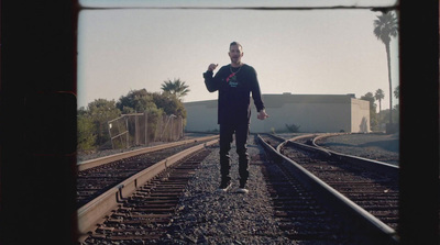 a man is standing on a train track