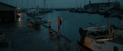 a boat docked at a dock