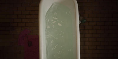 a bathtub filled with water in a bathroom